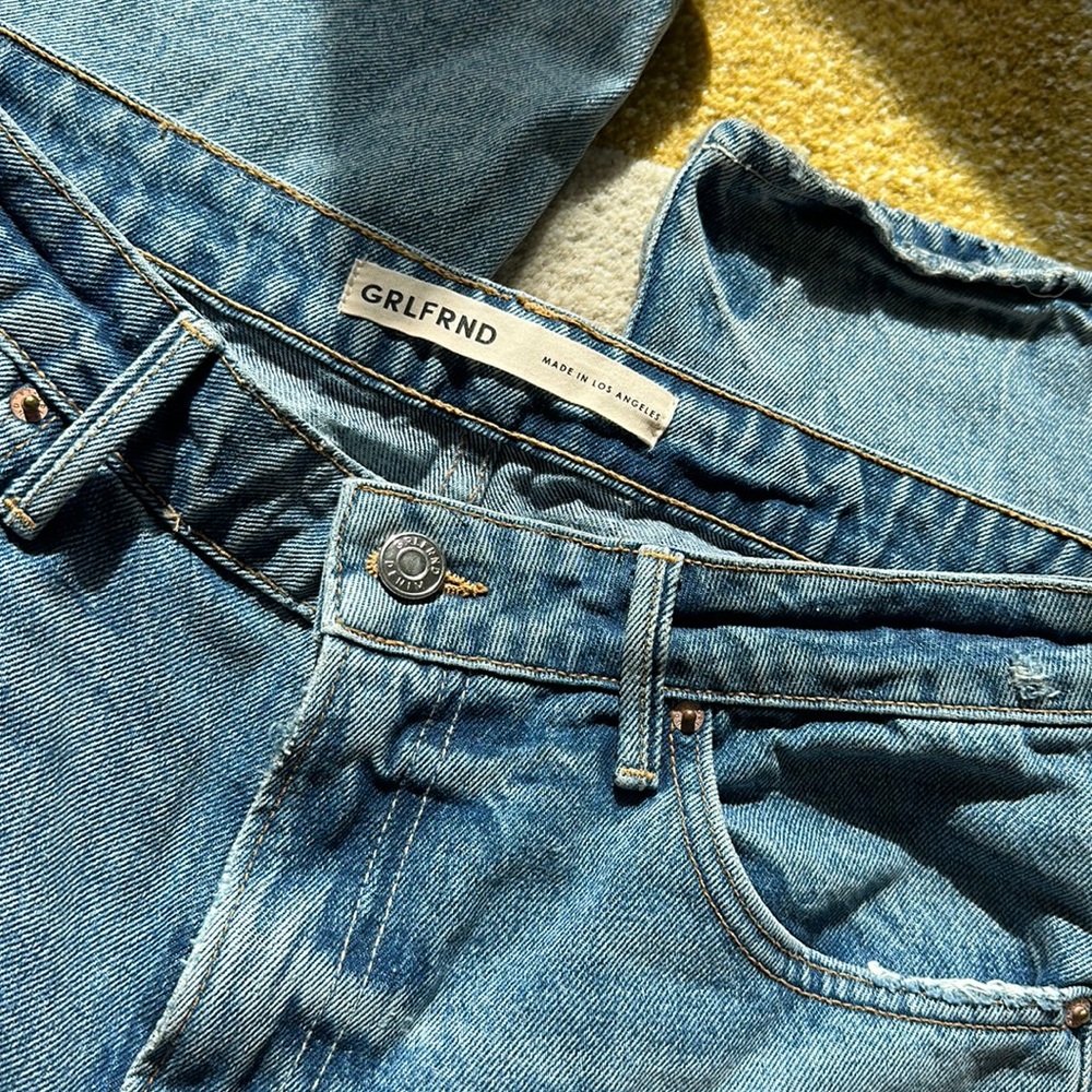 GRLFRND flared wide leg jeans with side slits size 25